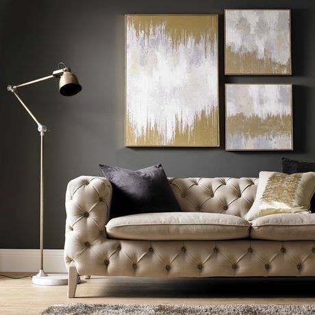 the painting on a wall in a living room