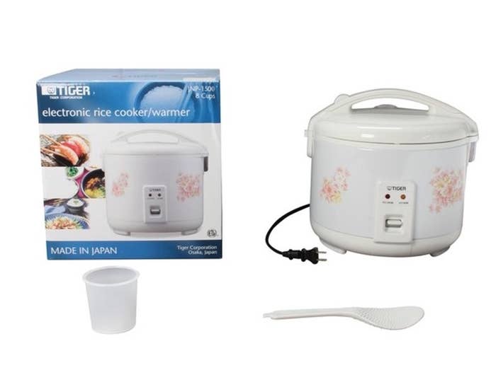 Rice cooker, cup, and spatula with packaging