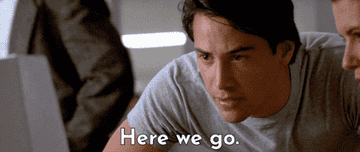 Keanu Reeves at a computer and saying, &quot;Here we go&quot;