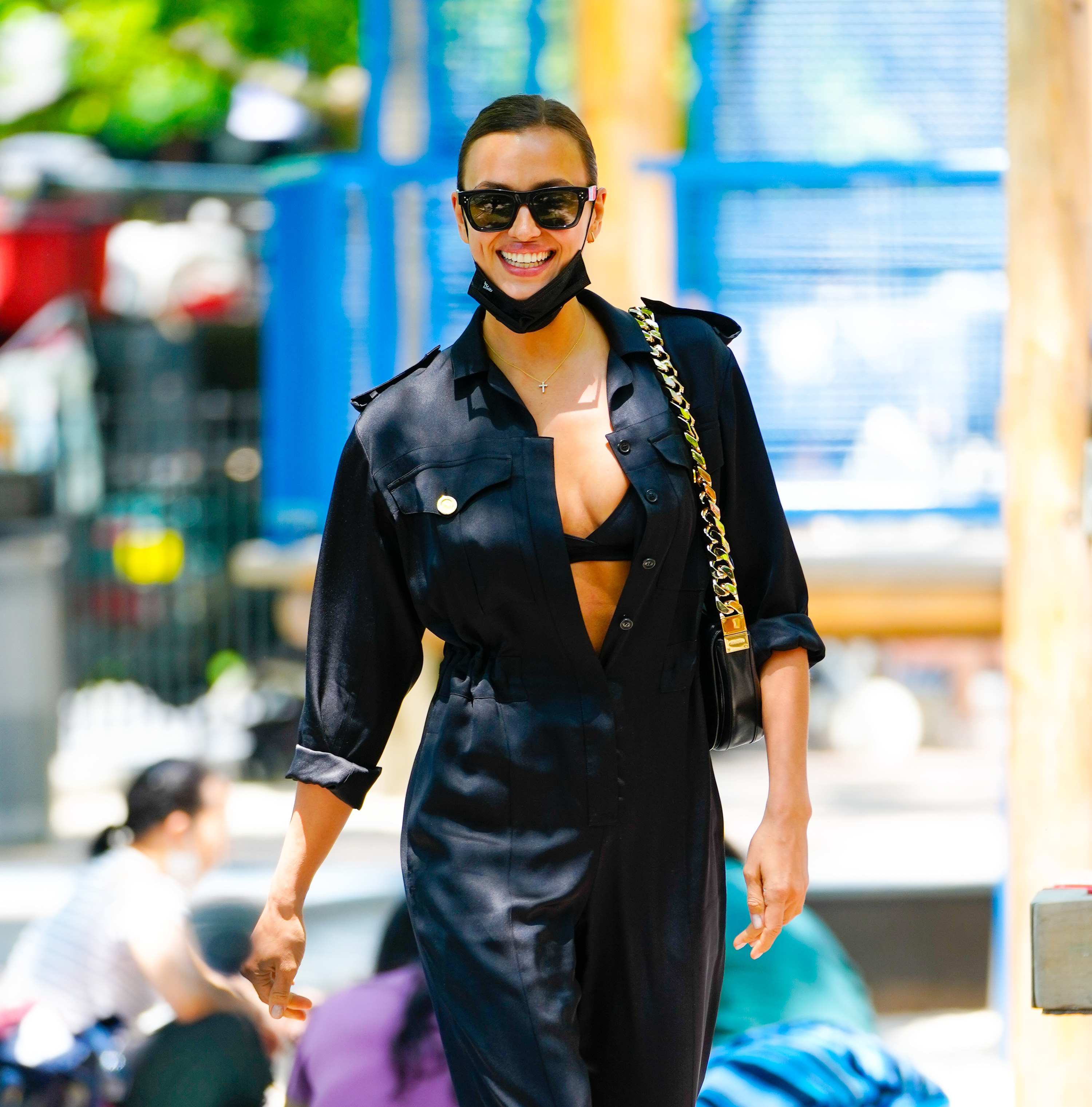 Irina Shayk is seen on June 10, 2021 in New York City wearing a jumpsuit and smiling