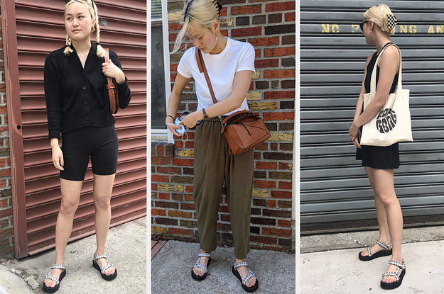 BuzzFeed editor wearing the sandals with bike shorts, olive green linen pants, and a black dress