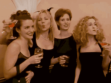 The women of &quot;Sex And The City&quot; pose with cocktails and cigarettes