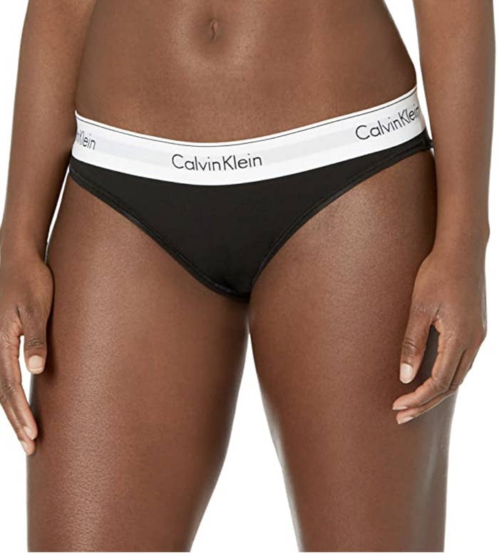 model torso wearing the black Calvin Klein bikini panty