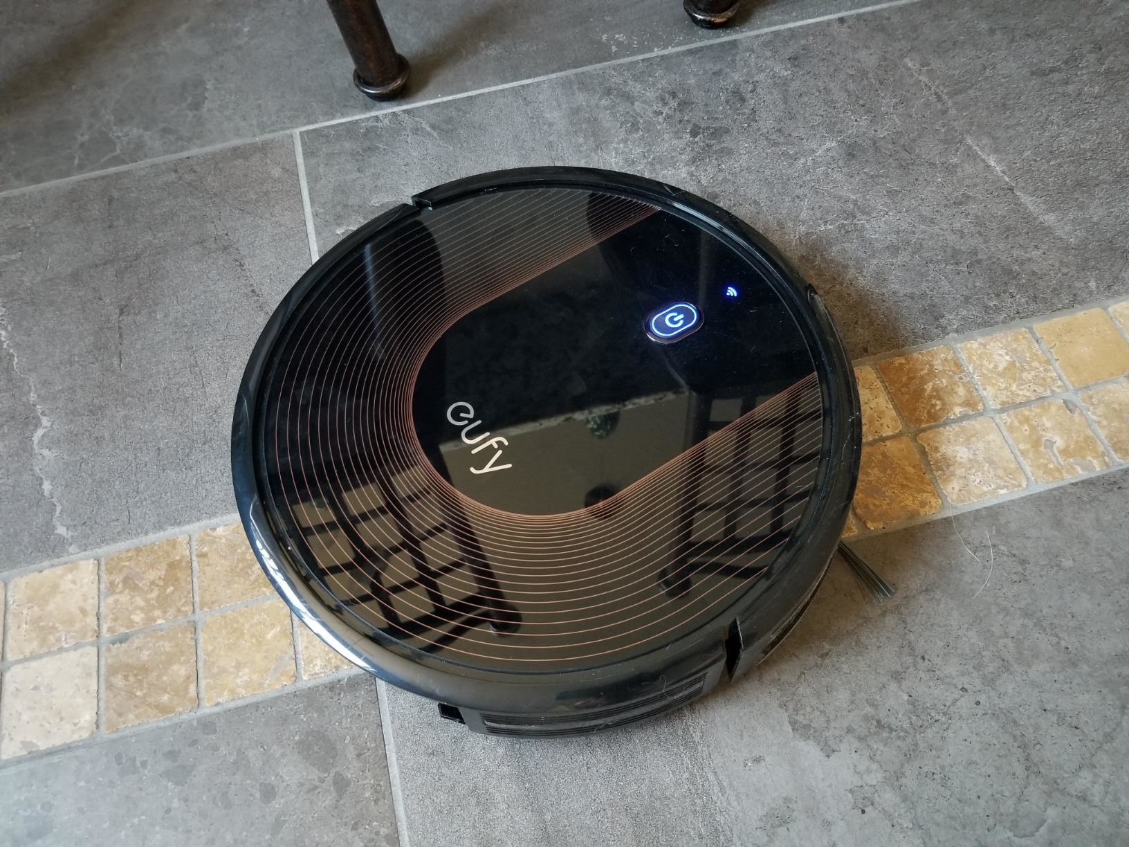 Round black robo vacuum 