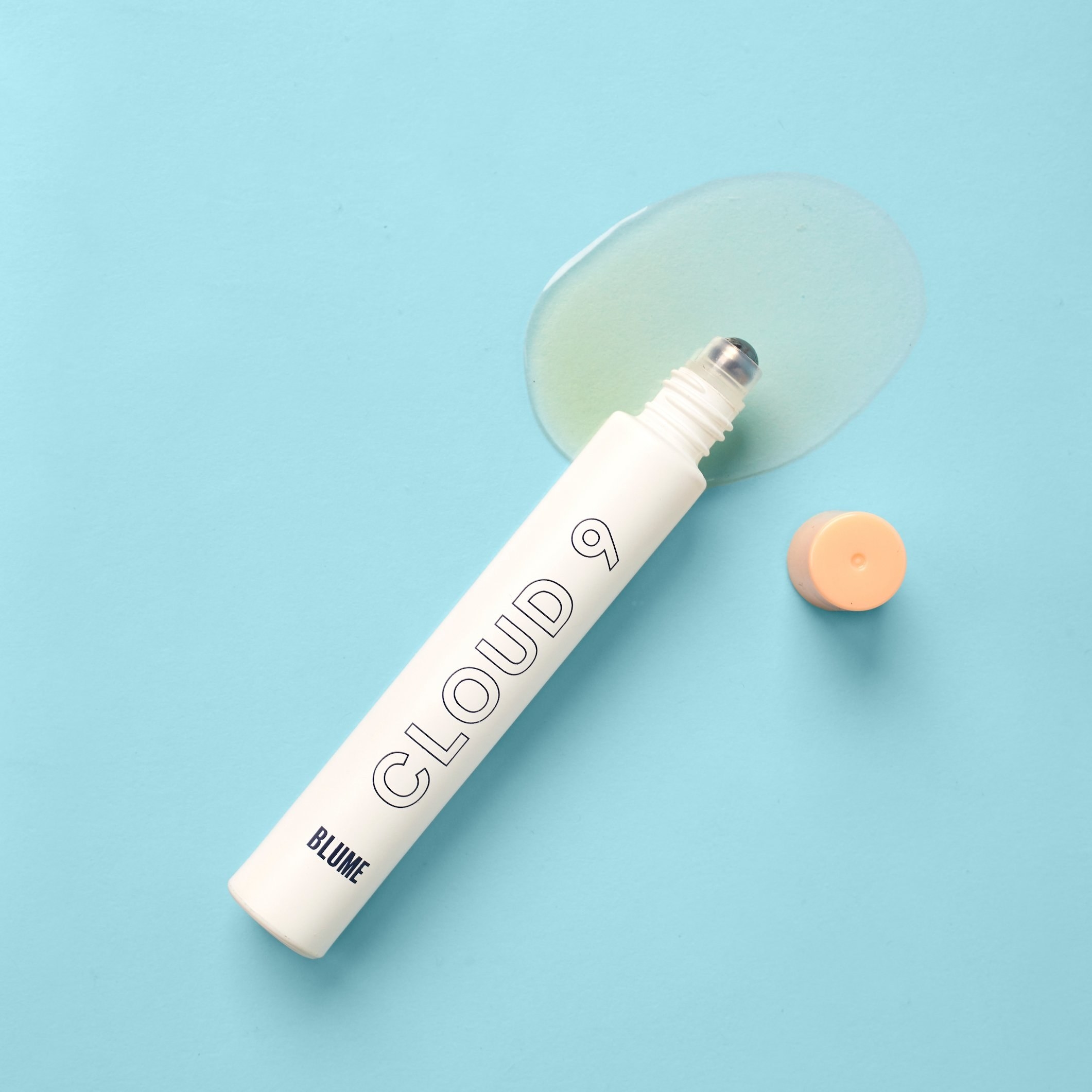 roll-on tube of blume cloud 9 essential oil with the cap off
