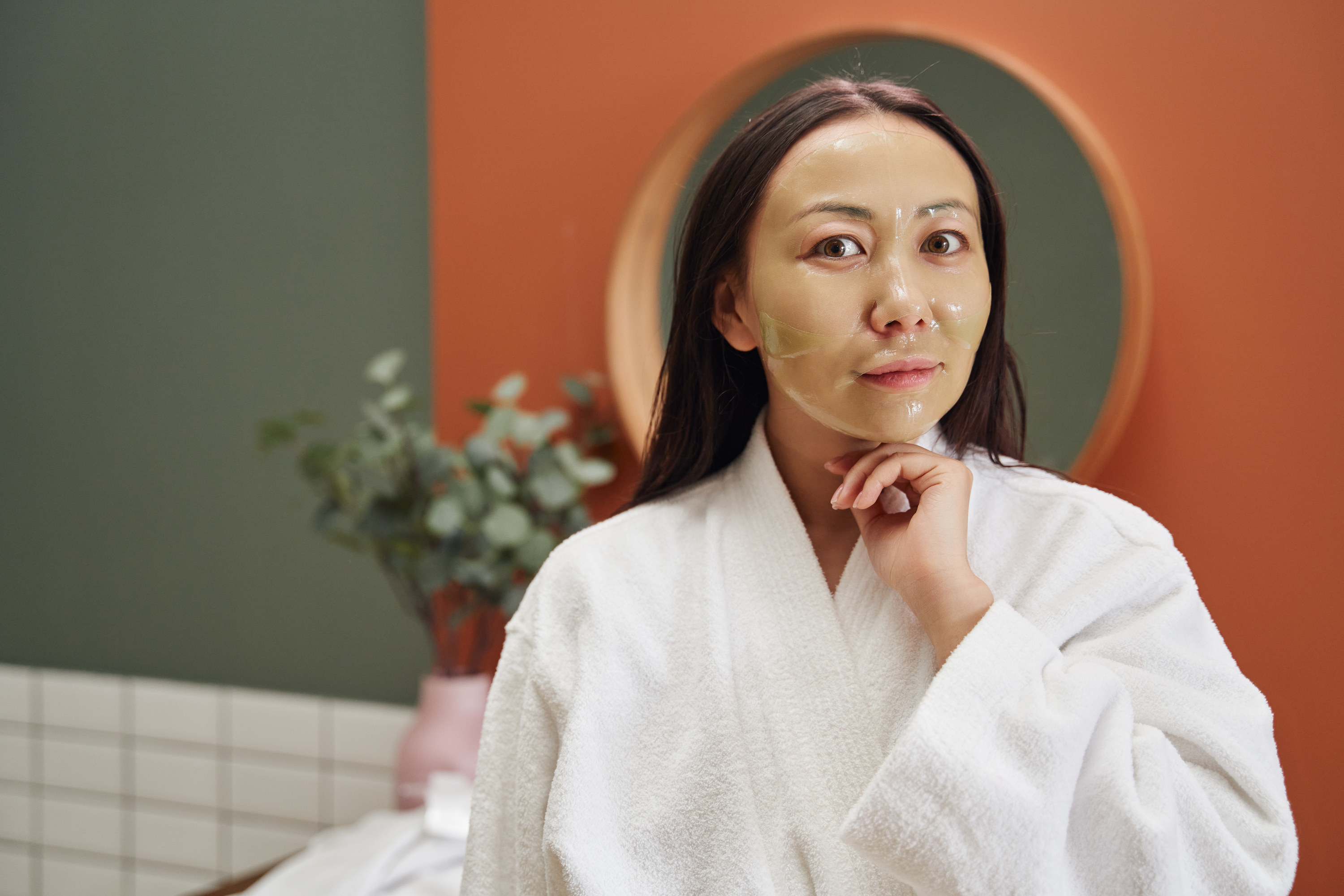 A person doing a skincare treatment