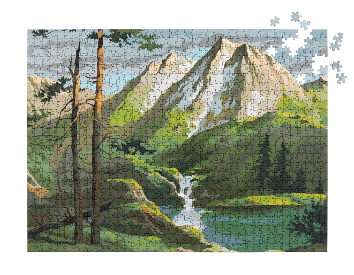The puzzle almost finished that shows its mountains design