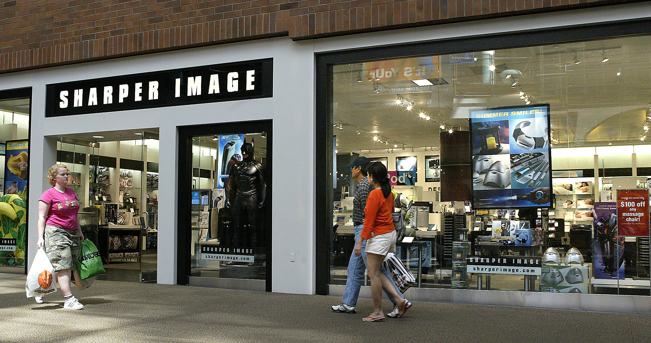 Exterior of a Sharper Image in a mall