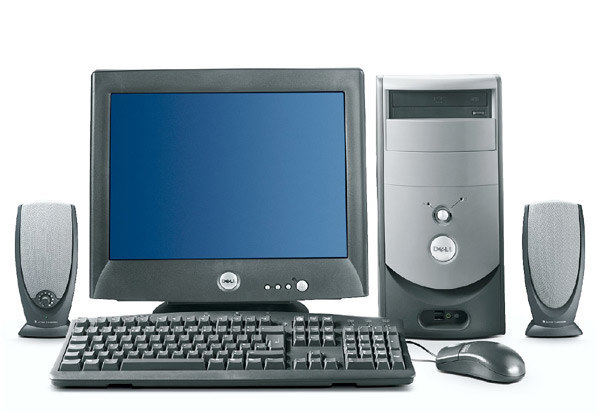 A Dell desktop computer with tower and speakers