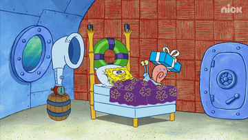 GIF of SpongeBob SquarPants jumping out of bed with birthday balloons