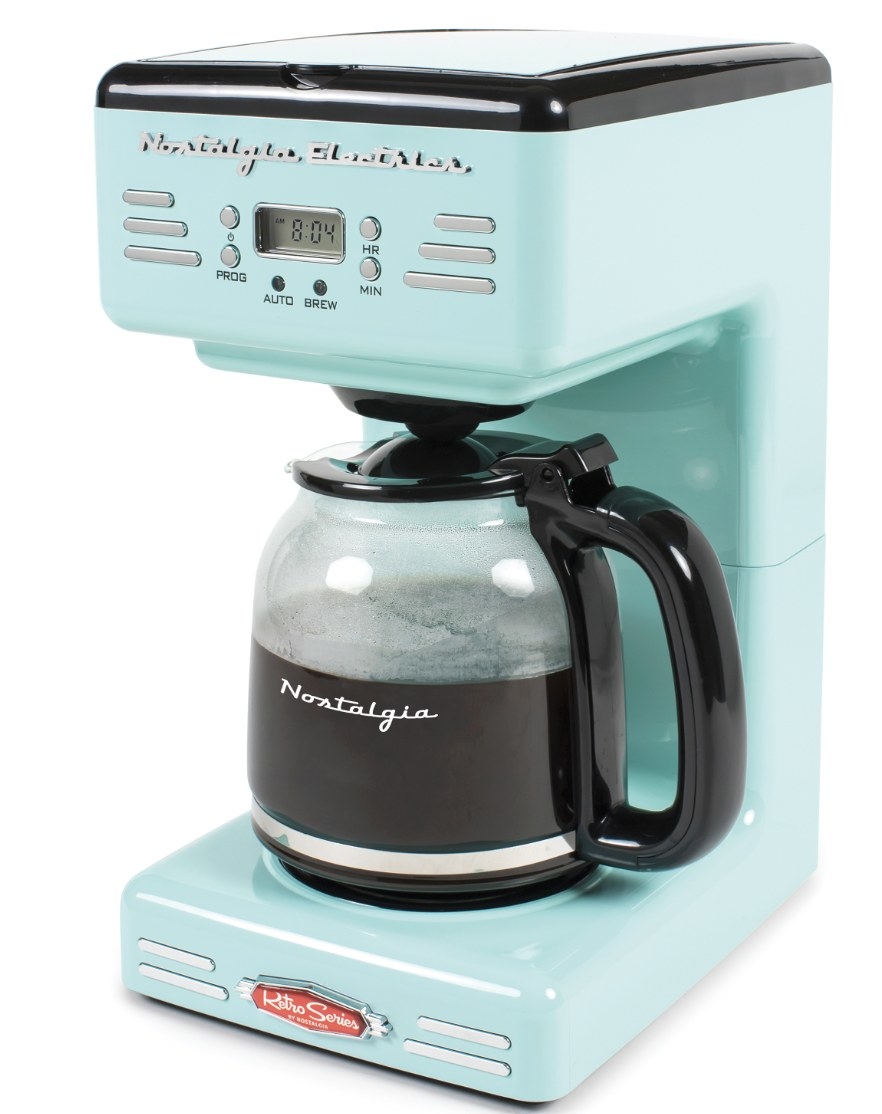 The aquamarine coffee maker  says &quot;Nostalgia Electric&quot; on top and &quot;Nostalgia&quot; on the pot itself