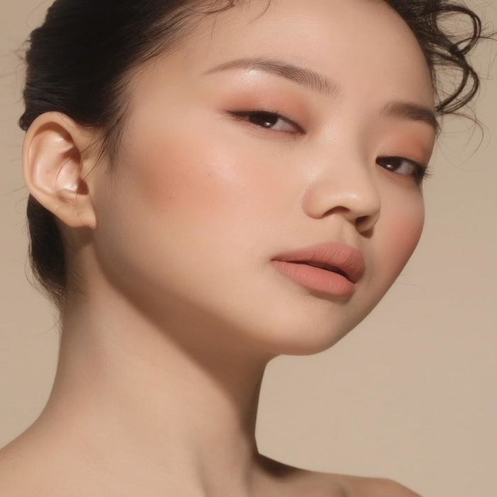 lighter nude shade used all over face on model