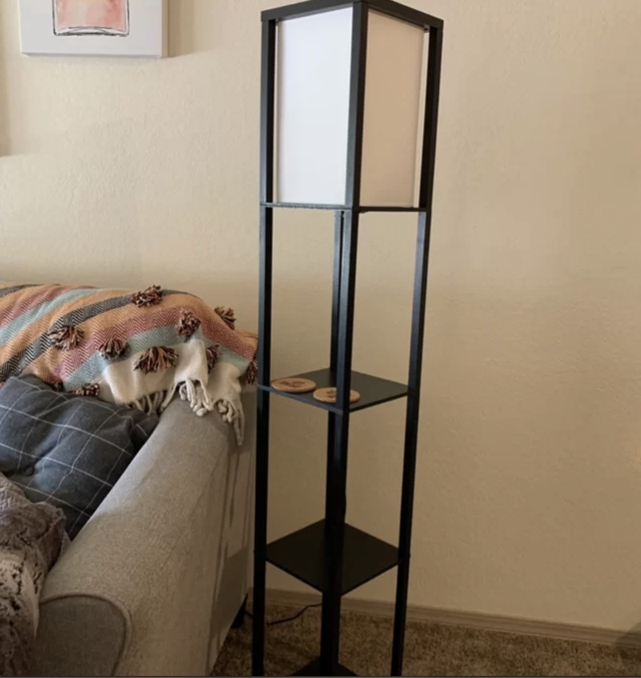 A reviewer&#x27;s back column floor lamp in a living space