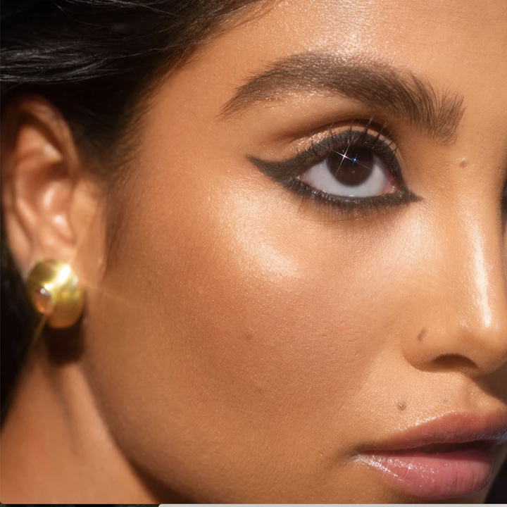 the eyeliner drawn Cleopatra-like 