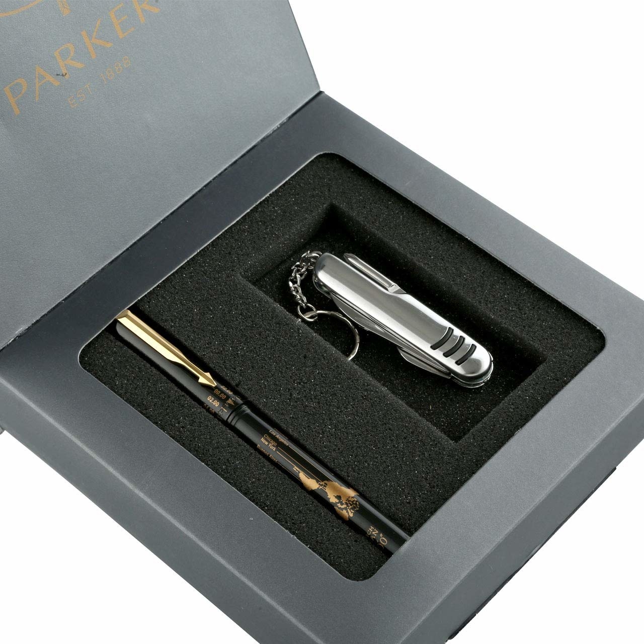 A Parker ball point pen in black and a Swiss Knife in a grey box.