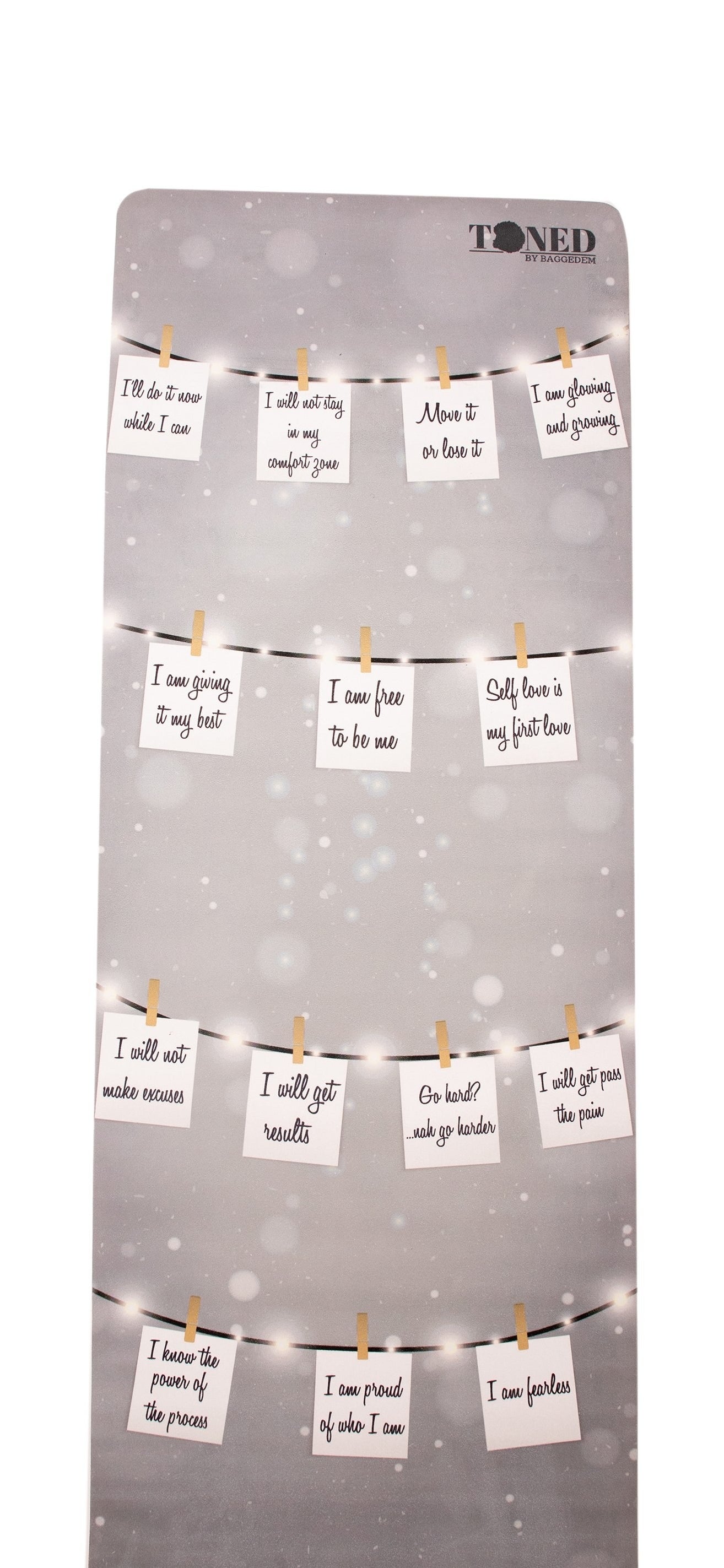 the gray affirmations mat with positive messages illustrated on stick notes on the mat