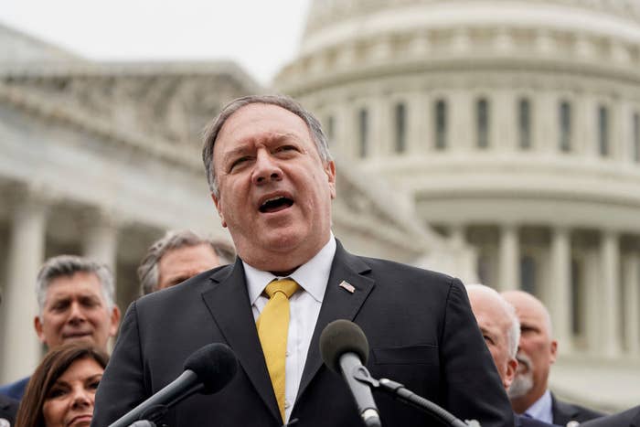 Then–secretary of state Mike Pompeo speaks at a podium.