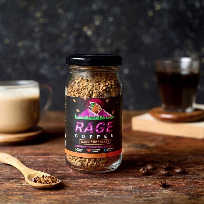 A bottle of Dark Chocolate Rage Coffee on a wooden countertop.