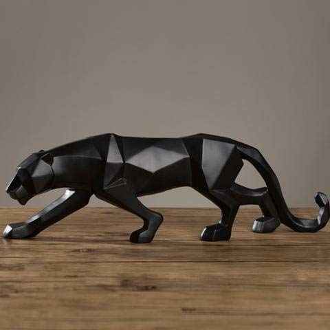 An abstract black panther figurine. 