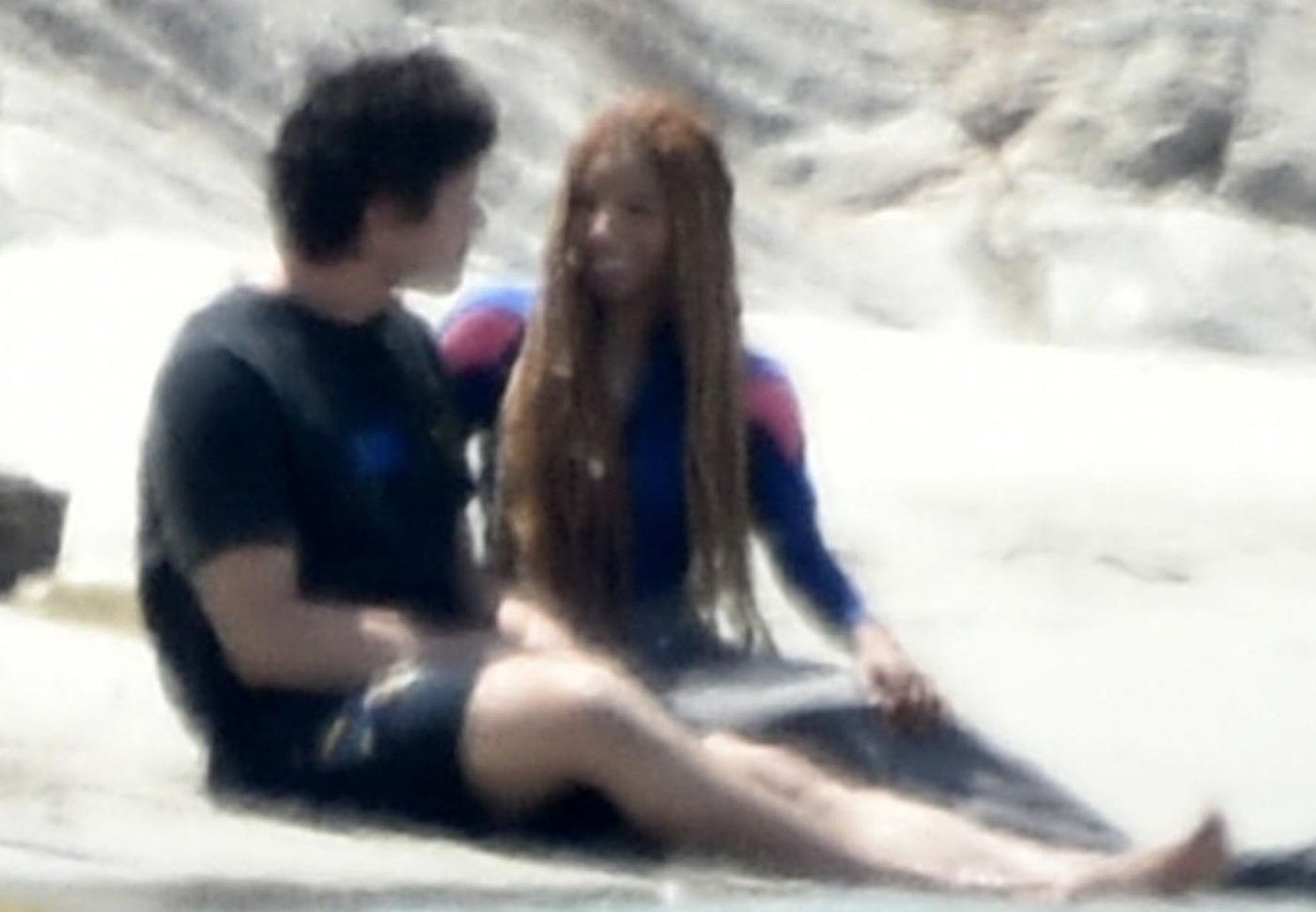 Close-up of them by the water; Halle is smiling