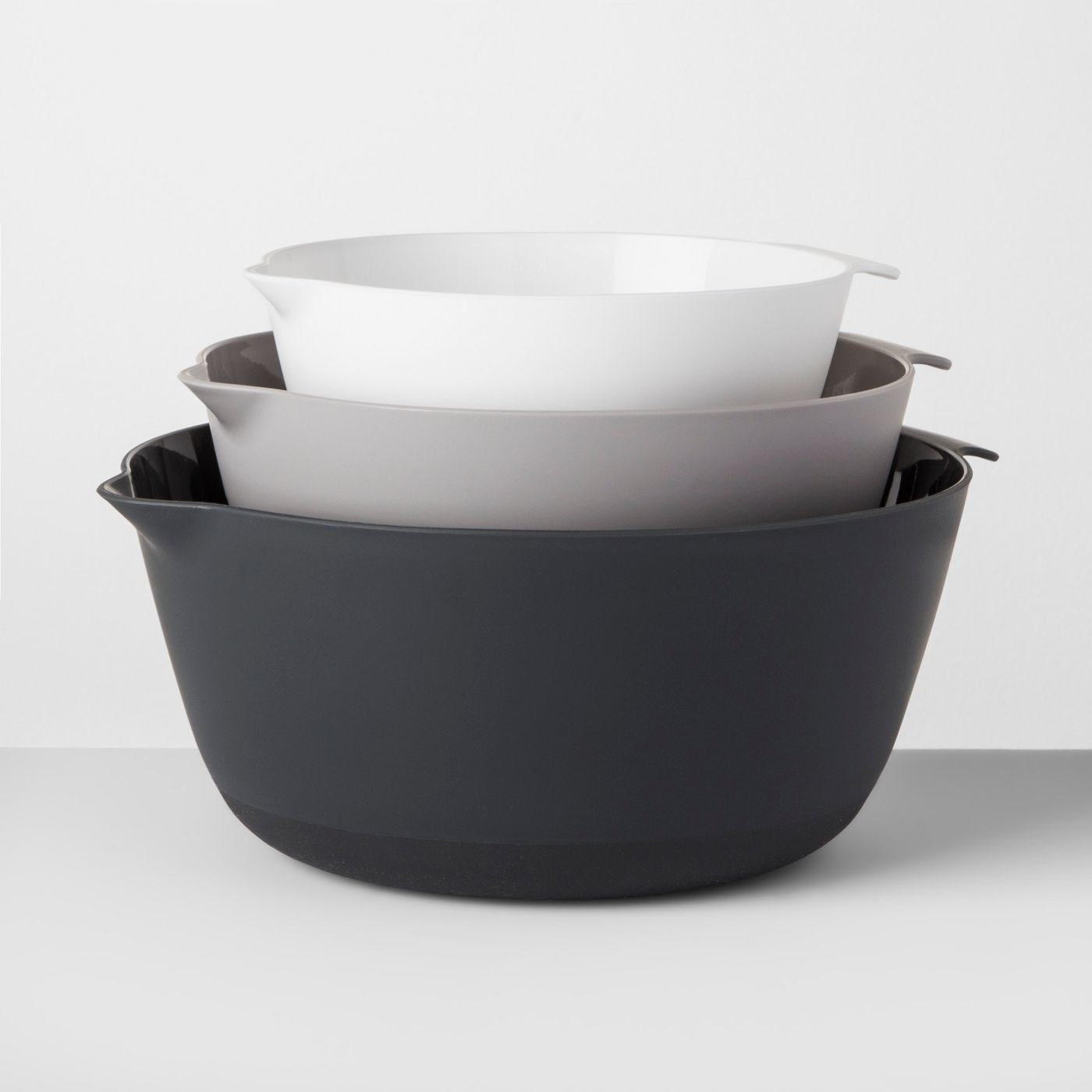 three different sized mixing bowls  in white, light grey, and dark grey