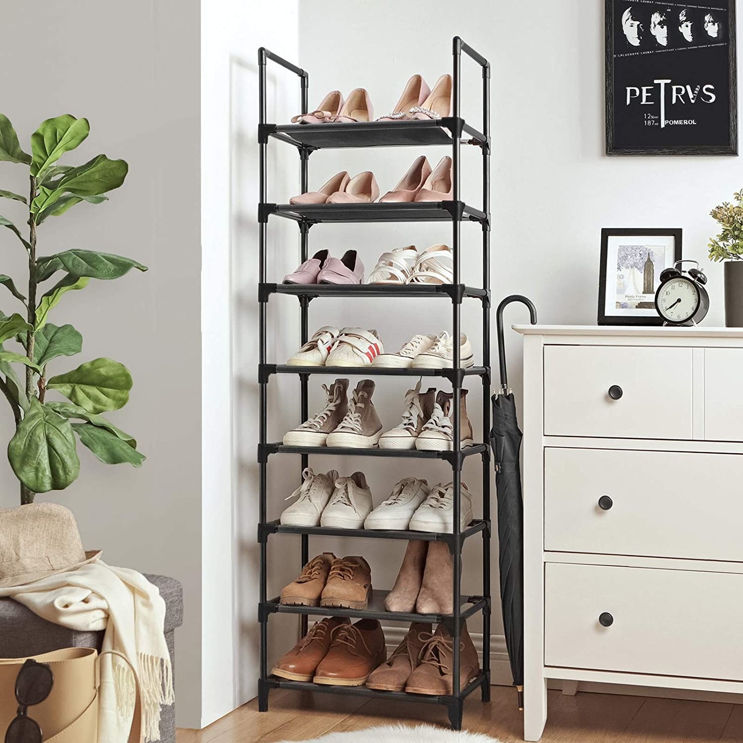 A tall shoe rack next to a dresser