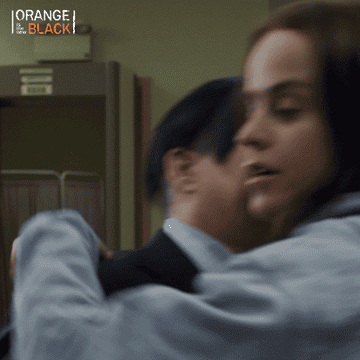 Taryn Manning goes in for a hug on set of &quot;Orange Is The New Black&quot;