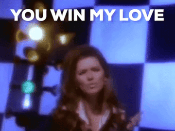 Gif of Shania Twain singing, &quot;you win my love&quot;