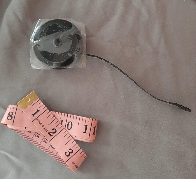 a reviewer&#x27;s two measuring tapes