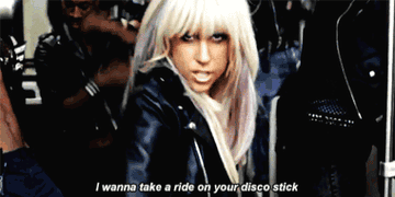 Lady Gaga in a subway singing &quot;I wanna take a ride on your disco stick&quot;