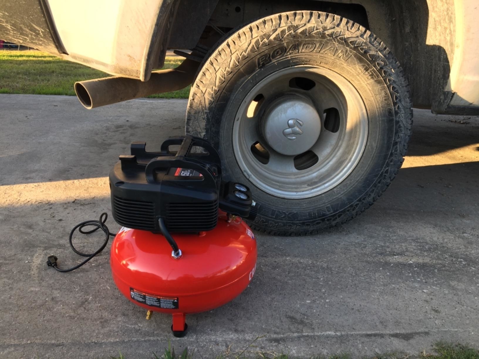 The compressor next to an RV tire