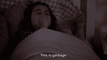 A gif of Ruth from New Girl saying this is garbage