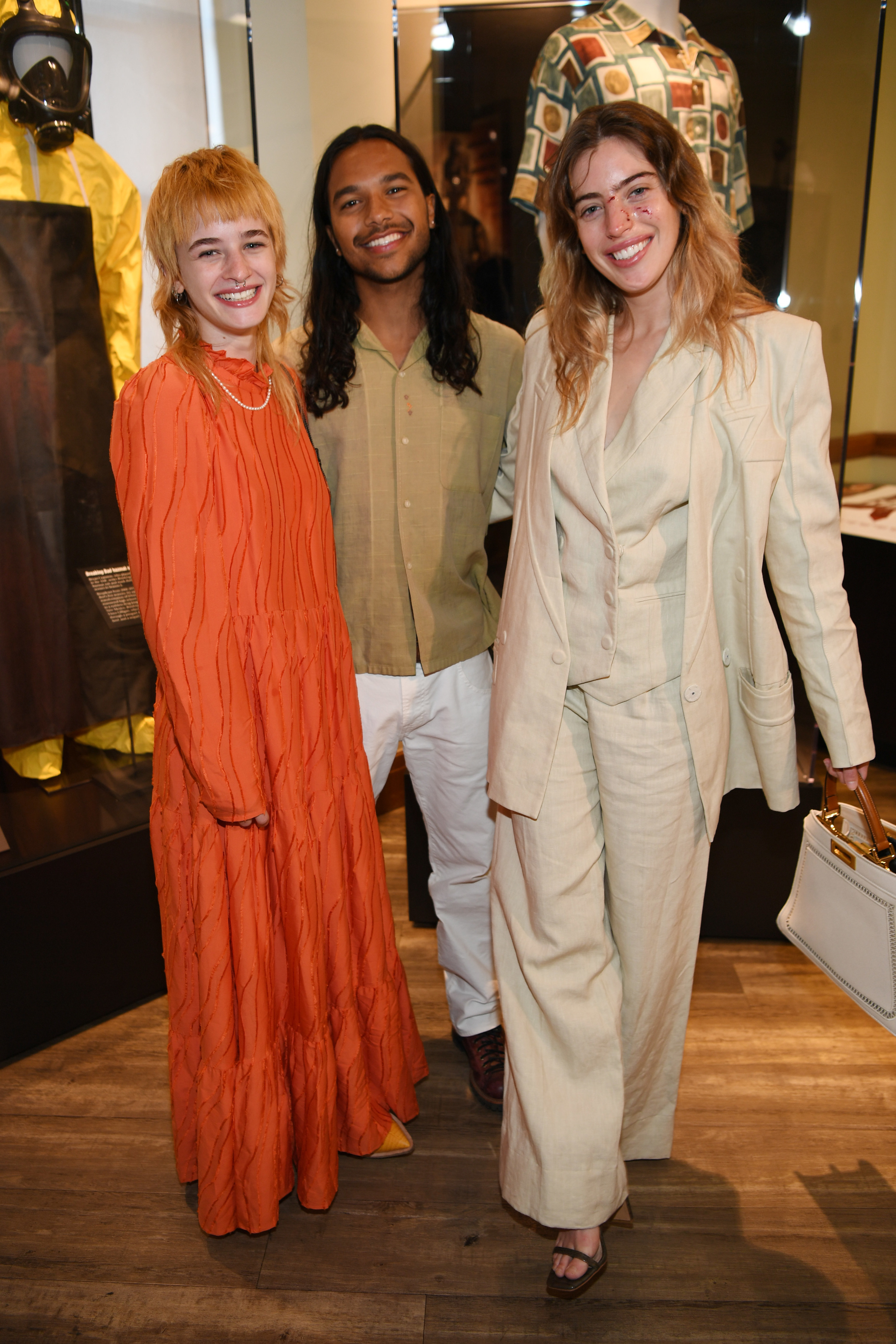 Clara smiles while posing with her sister at the event