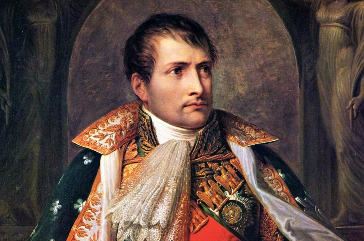 A painting of Napoleon looking to his left and wearing finery. 