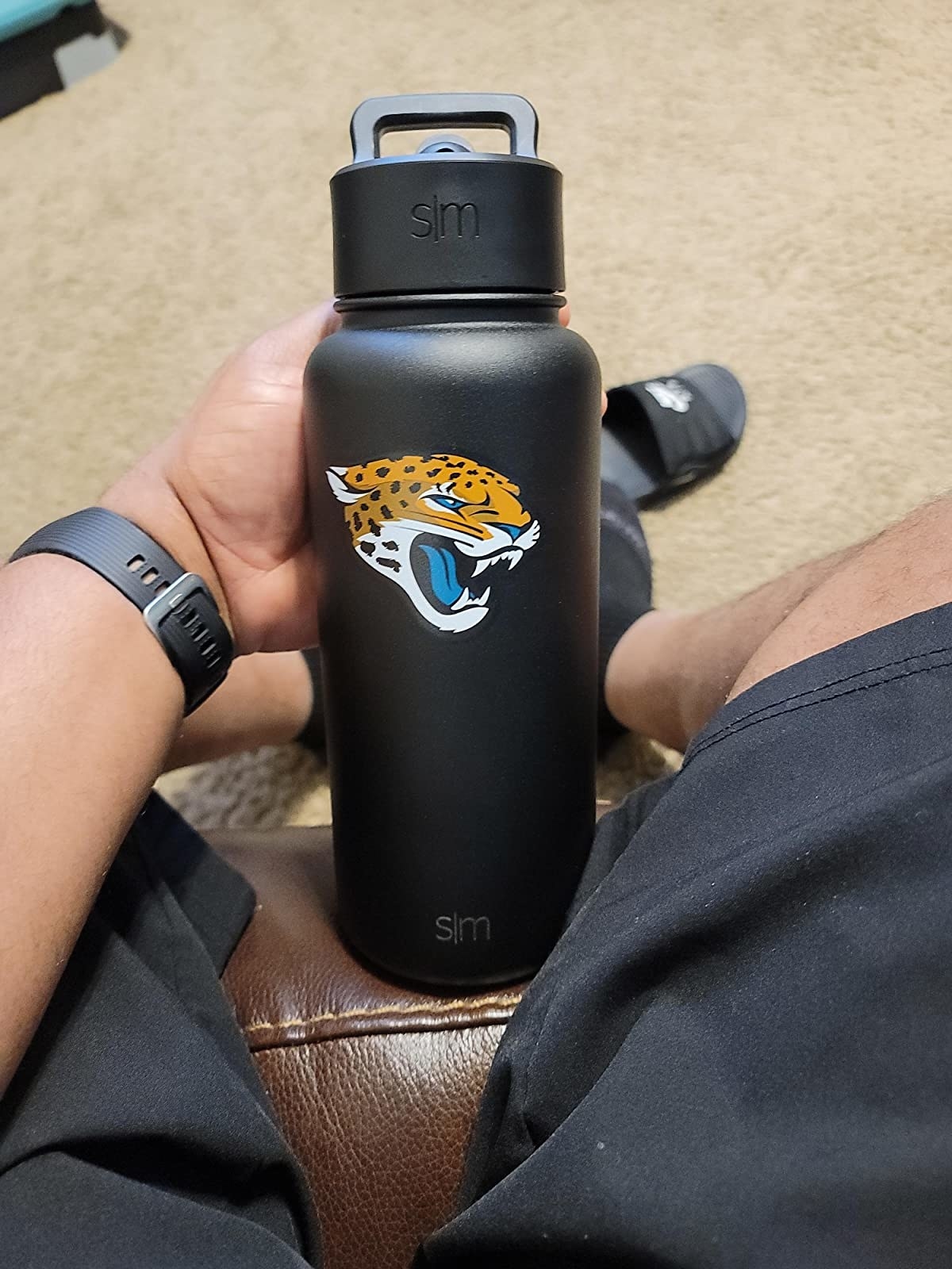 The bottle with a jaguar on it