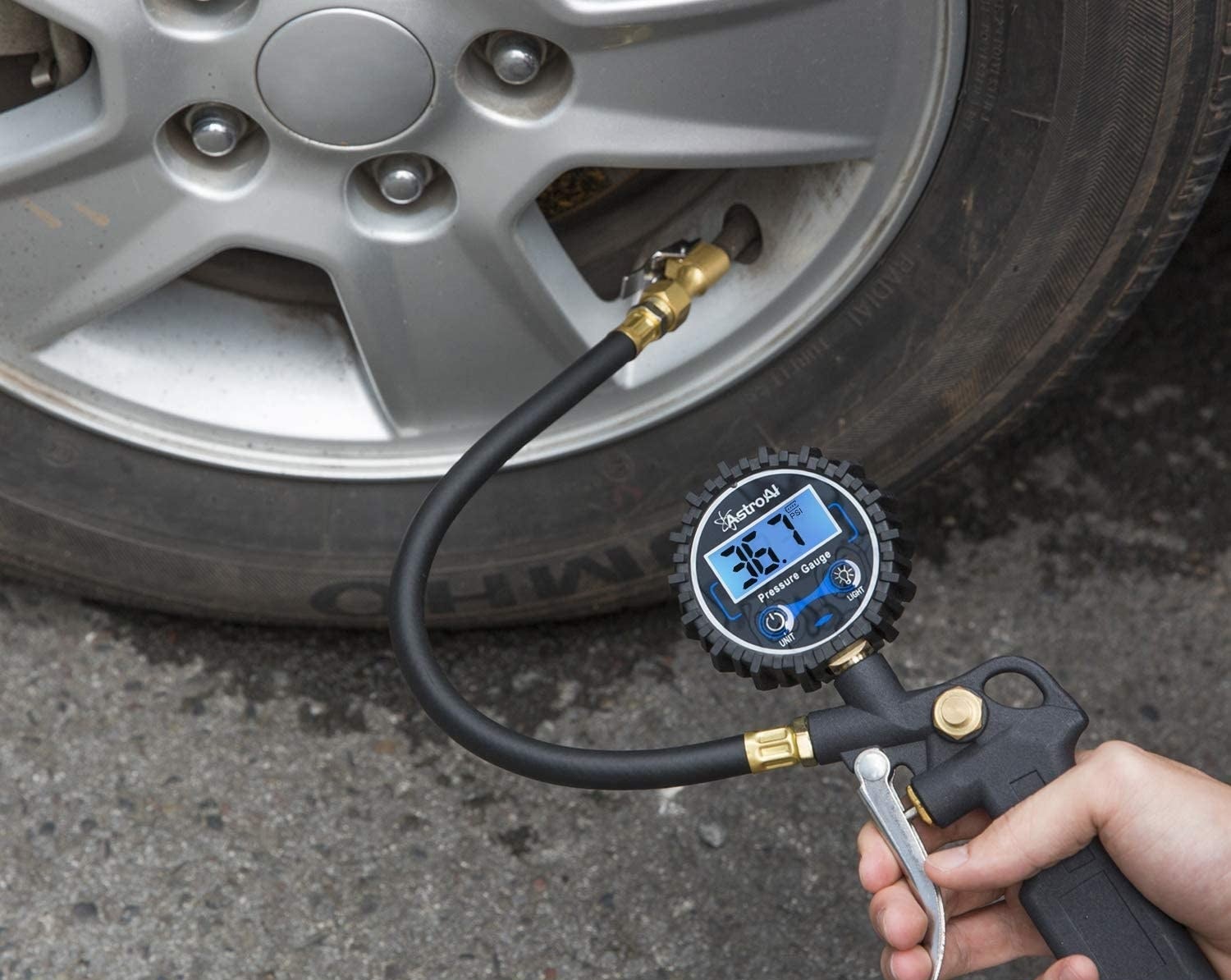 A digital tire inflator with a pressure gauge 