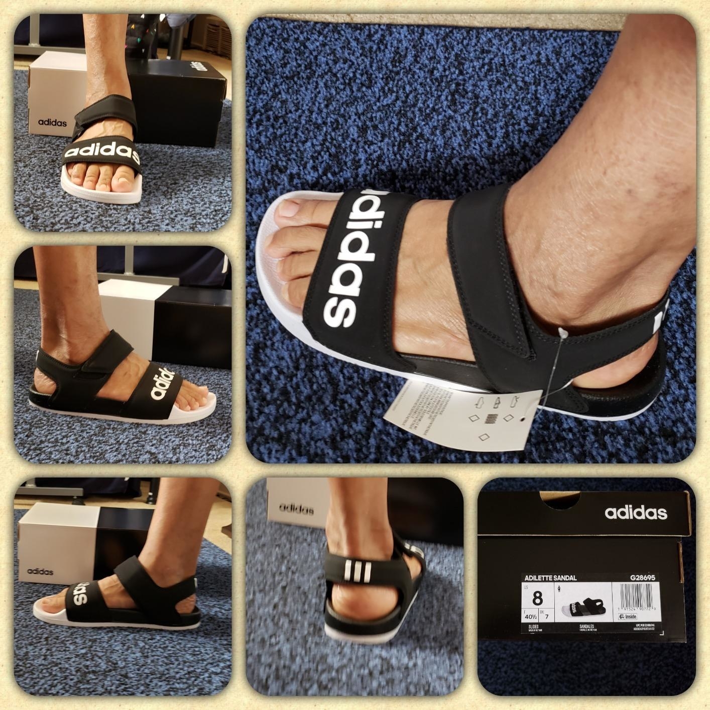 reviewer wearing the black and white logo sandals