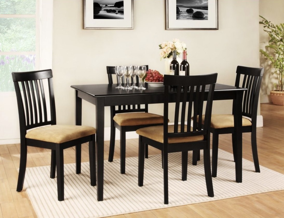 the dining table and four chairs