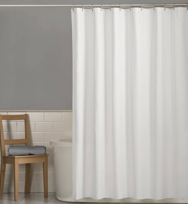 the white shower curtain