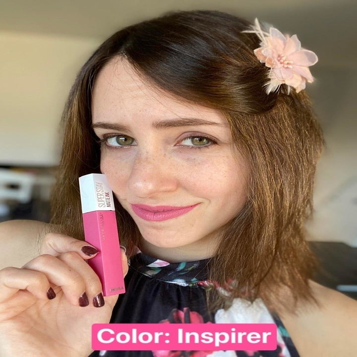 reviewer wearing light pink shade
