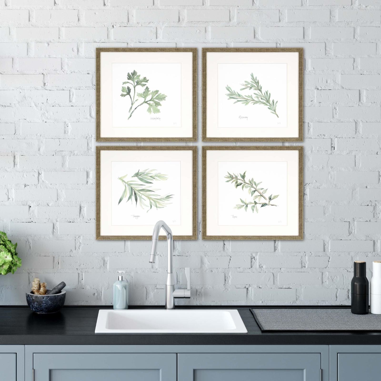 set of 4 herb prints above a kitchen sink