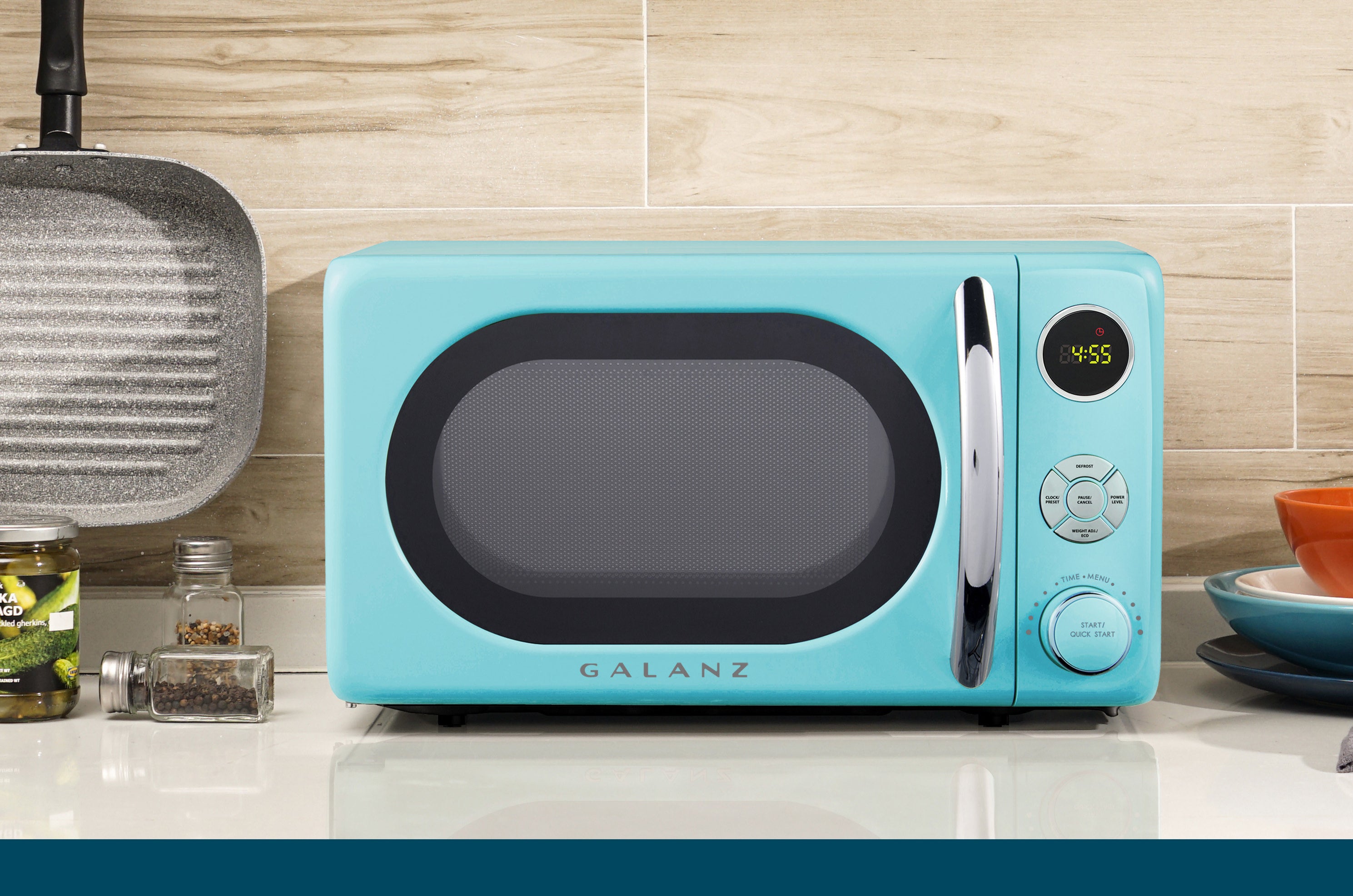 The blue retro-style countertop microwave oven