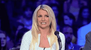 Britney Spears making a &quot;yikes&quot; reaction face on &#x27;X Factor&#x27;
