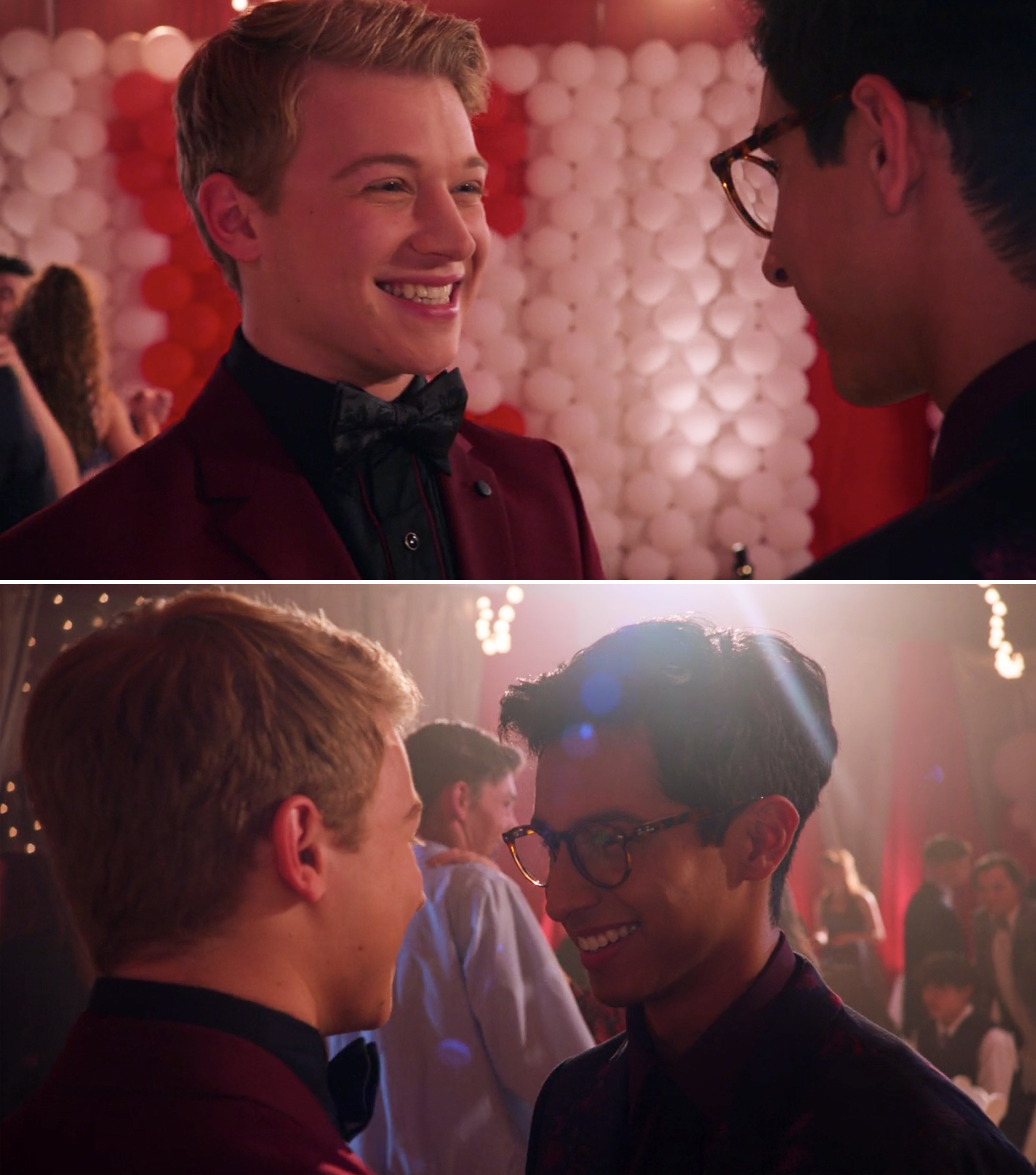 Seb and Carlos smiling at each other on the dance floor