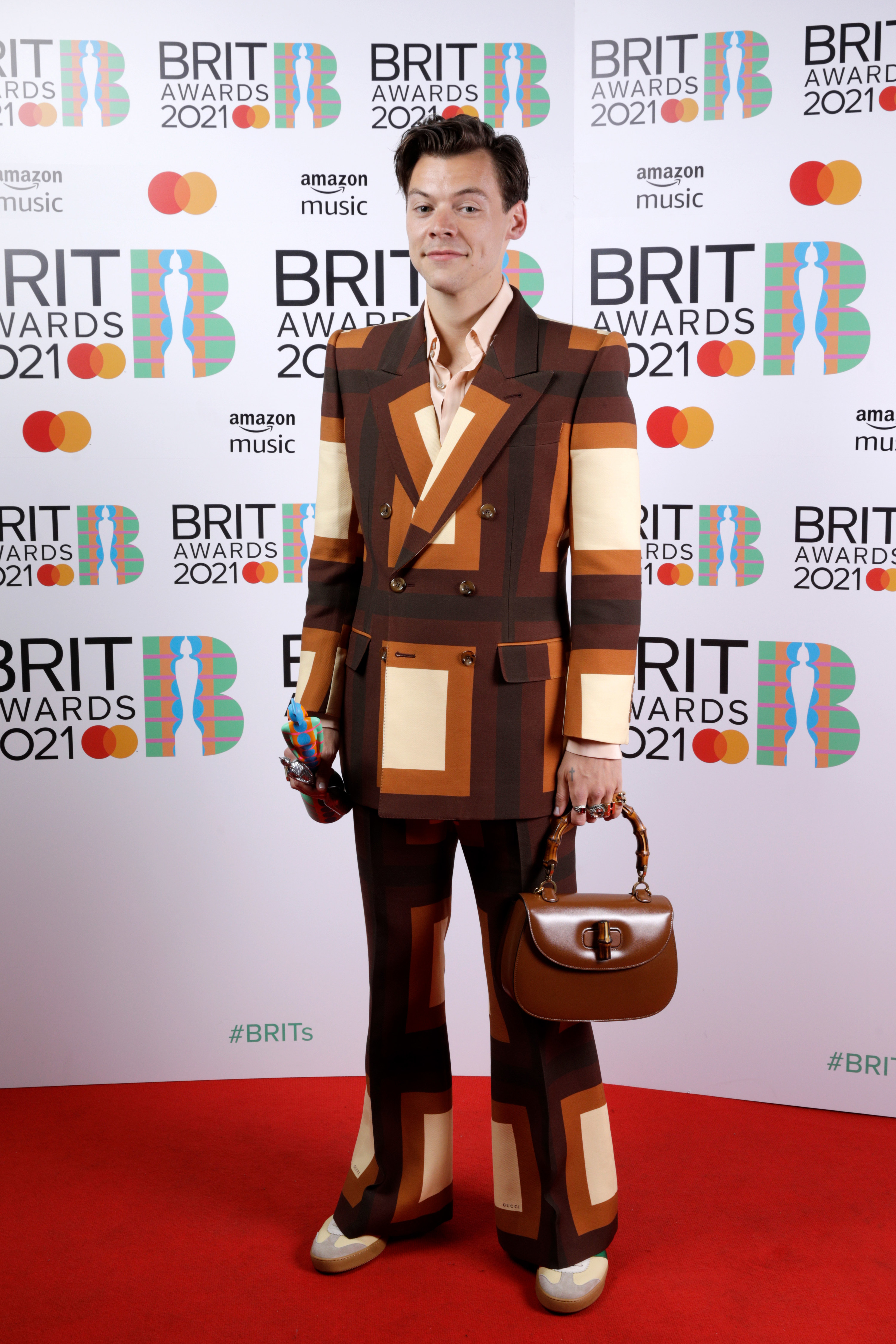 Harry Styles wins the Mastercard British Single award for Watermelon Sugar during The BRIT Awards 2021 at The O2 Arena on May 11, 2021 in London, England
