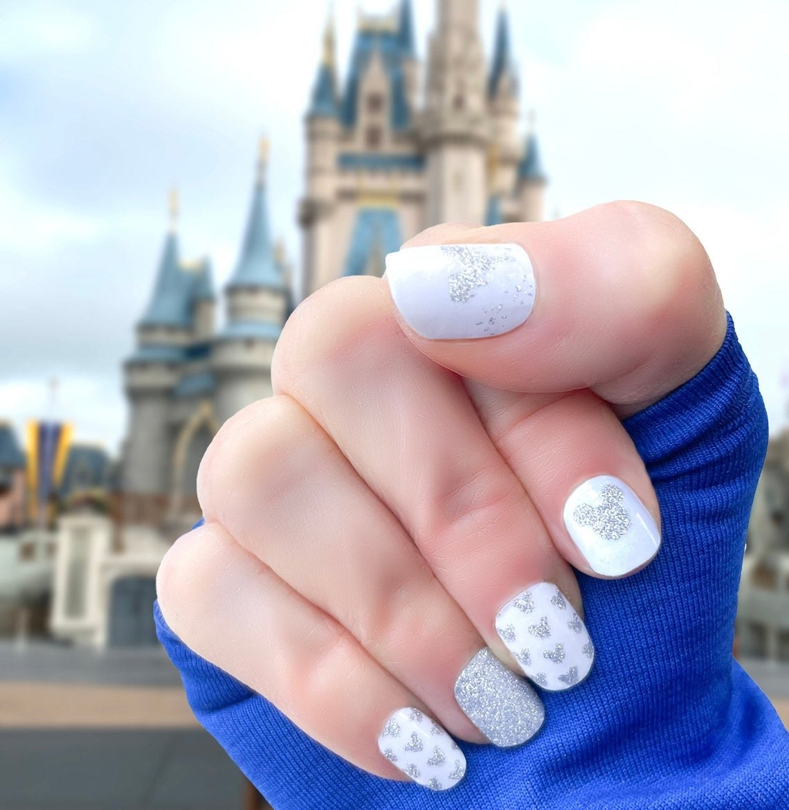 nails with glittery mickey mouse patterns