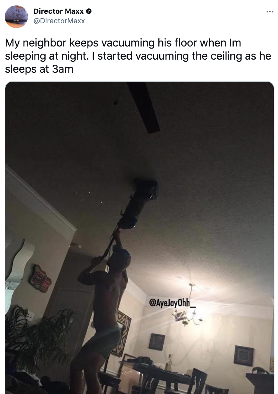 A tweet about a person vacuuming the ceiling to bother their neighbor