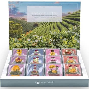 an open box of individually wrapped blooming tea balls 