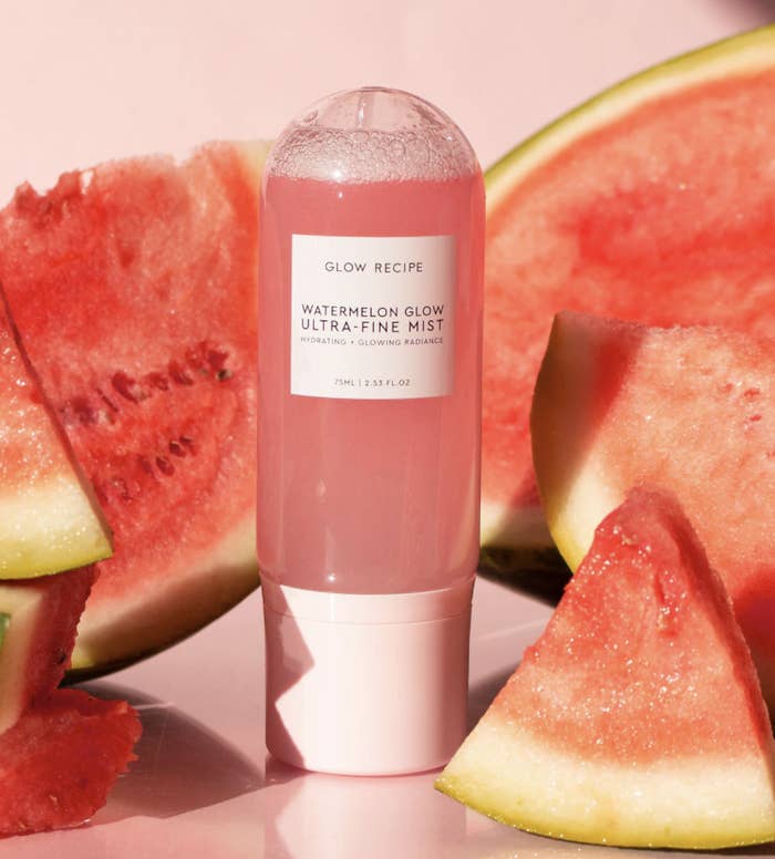 the bottle surrounded by watermelon