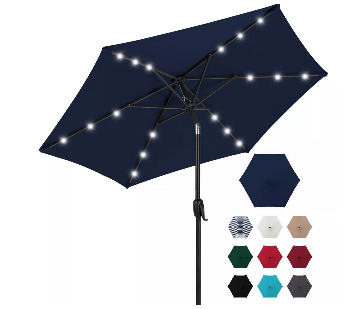 Navy blue outdoor umbrella with solar powered LED lights underneath 